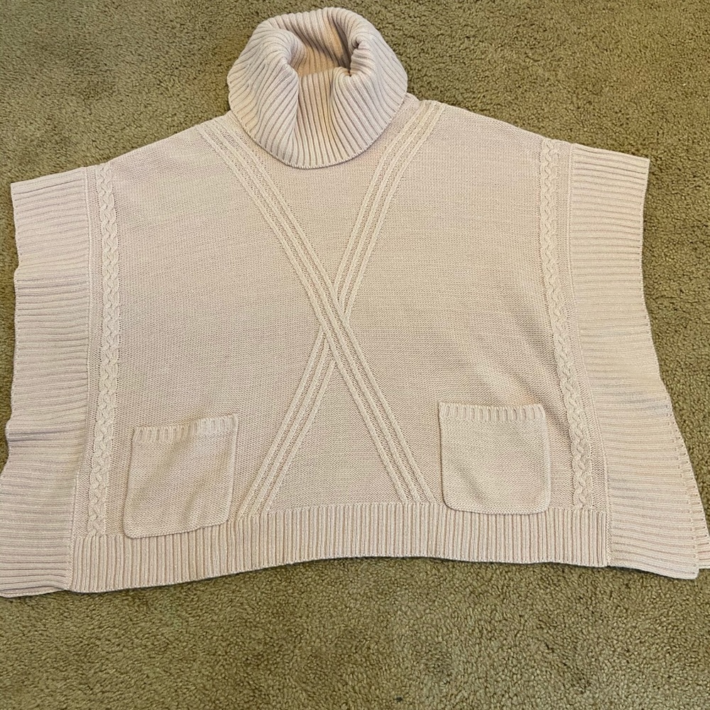 Light pink poncho size small